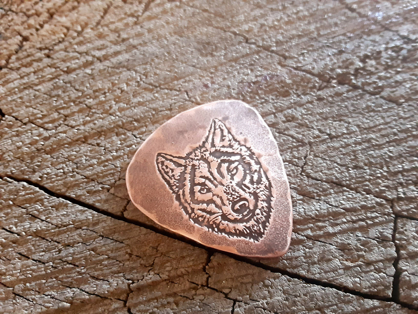 Wolf themed copper guitar pick