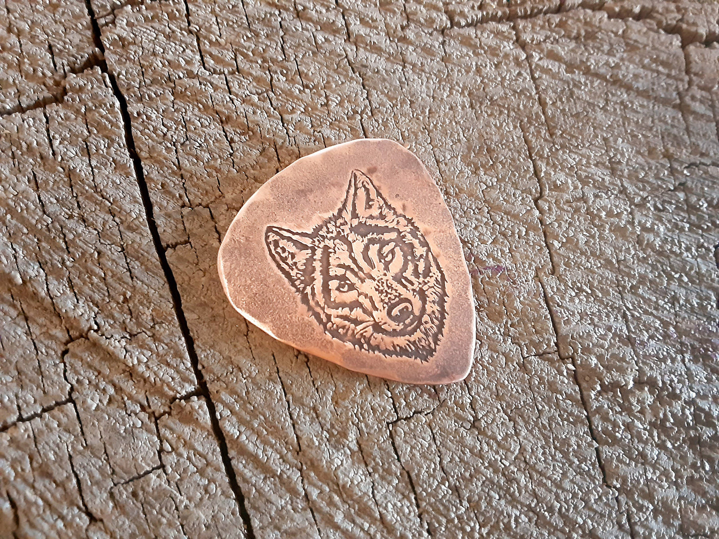 Wolf themed copper guitar pick
