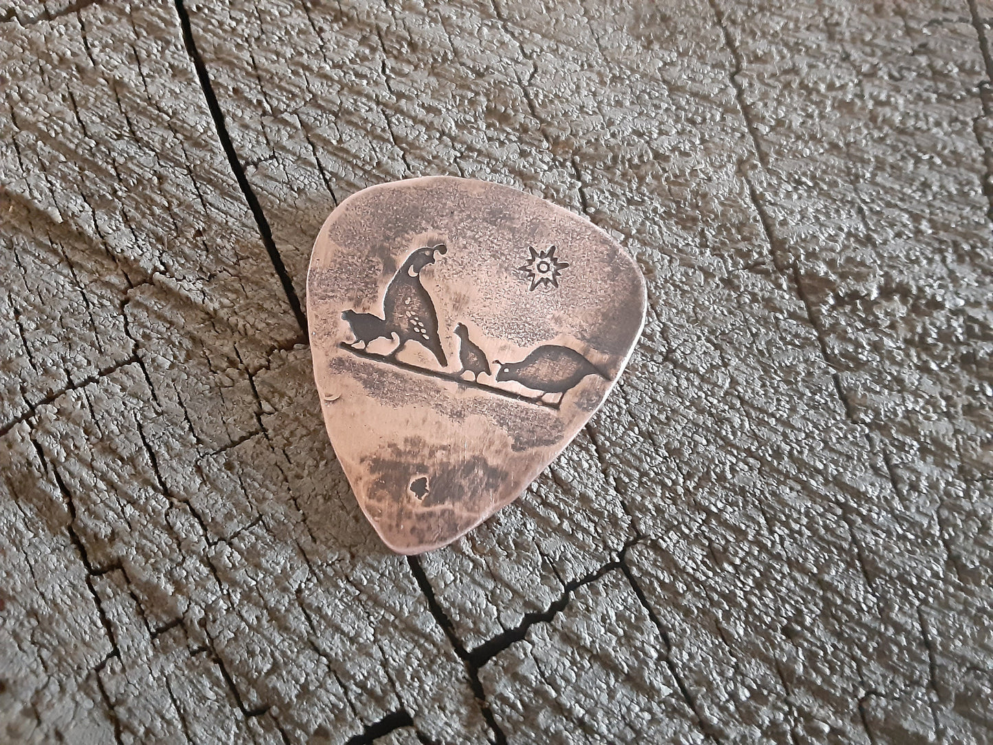 Guitar pick desert quail on copper guitar pick