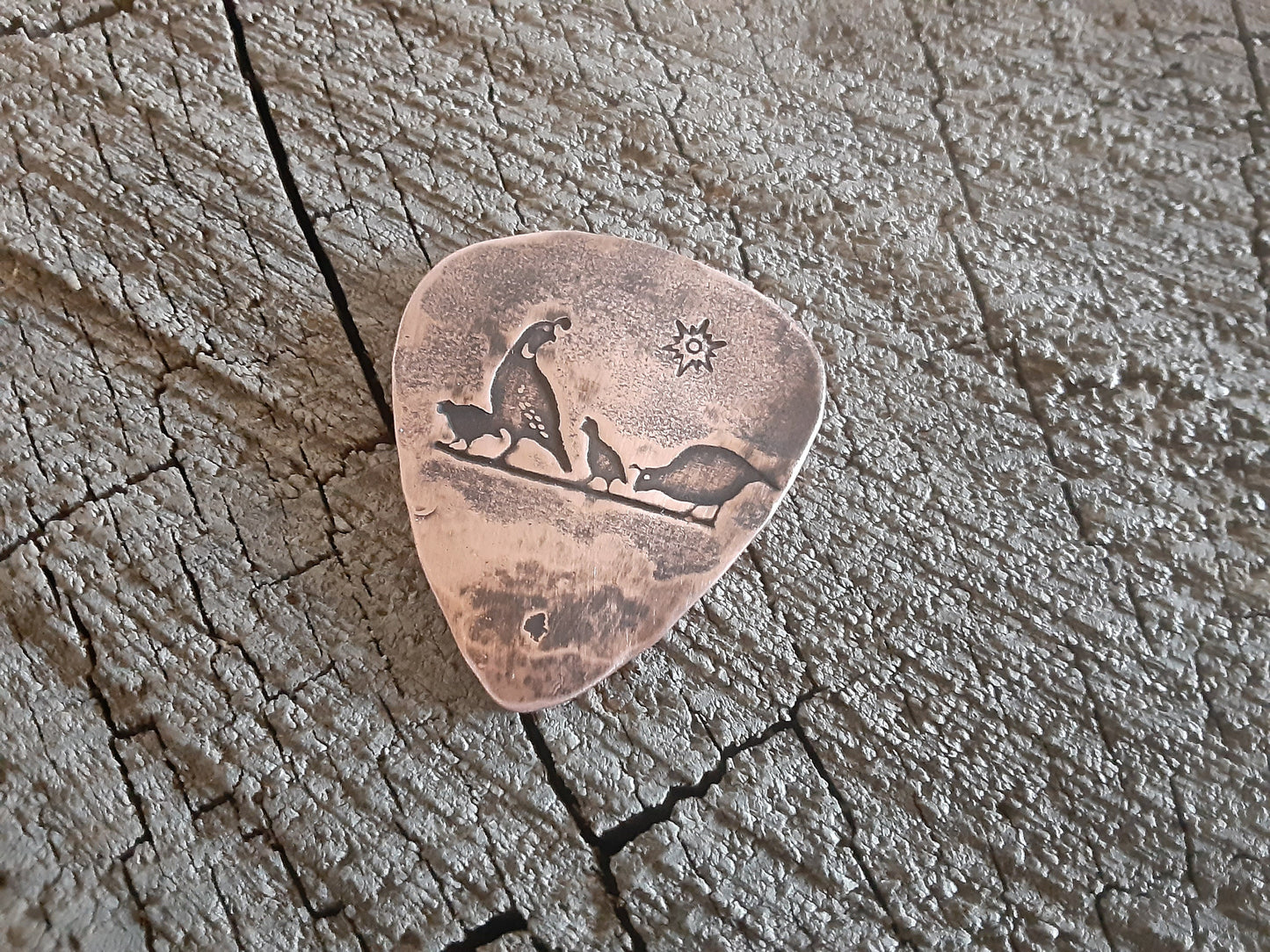 Guitar pick desert quail on copper guitar pick