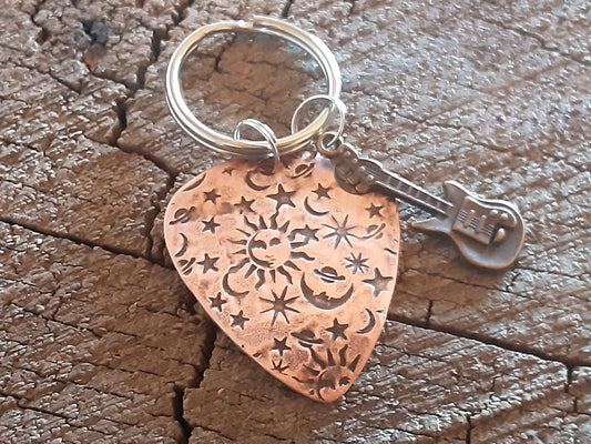 copper guitar pick keyring with sun moon and stars and small brass guitar charm - backside is hammered for better grip - playable