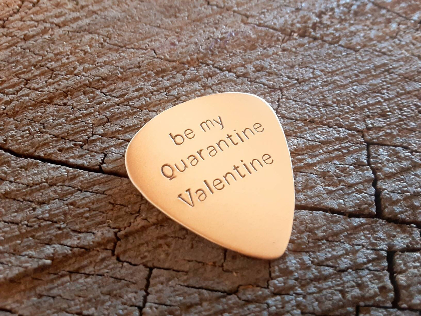 Bronze guitar pick