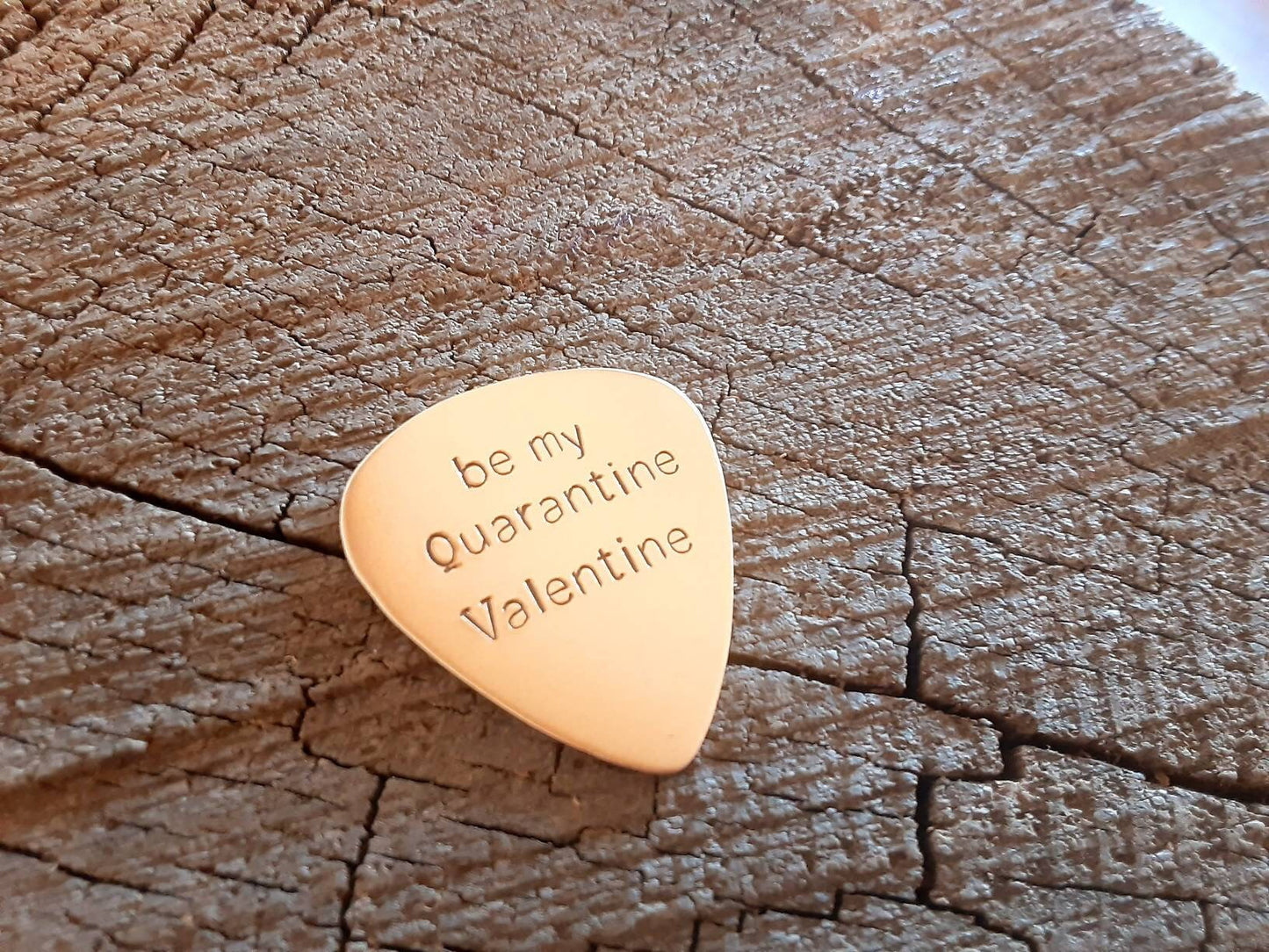 Bronze guitar pick