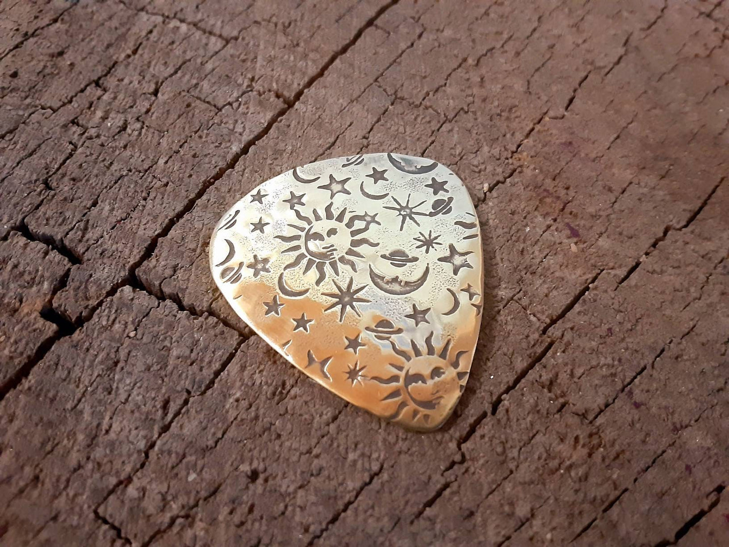 Limited Edition Brass guitar pick- playable with sun moon and stars - A NicisPicks Original - Collectible - with stand and gift wrapped