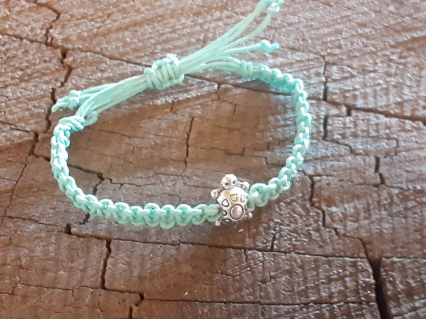 Light blue hemp anklet or bracelet with small tortoise bead