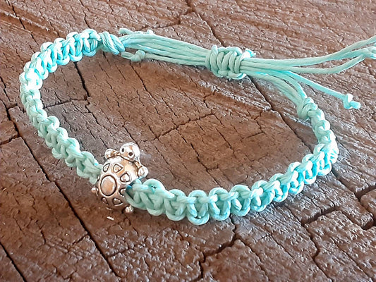 Light blue hemp anklet or bracelet with small tortoise bead