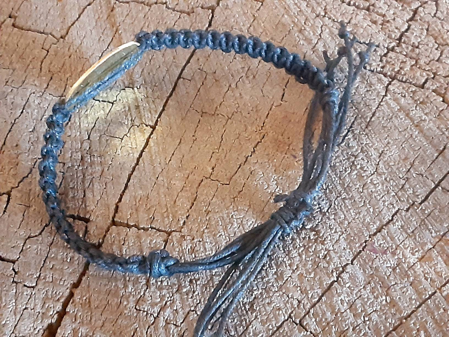 Black hemp bracelet with brass dragonfly