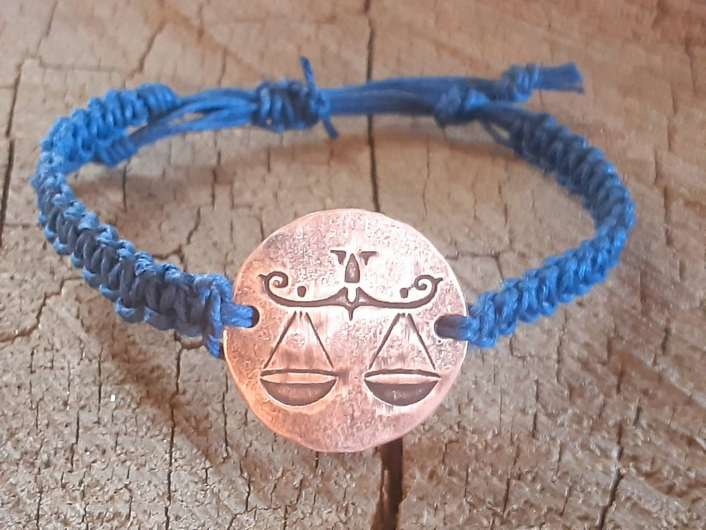 Libra zodiac sign bracelet with copper tag and blue hemp