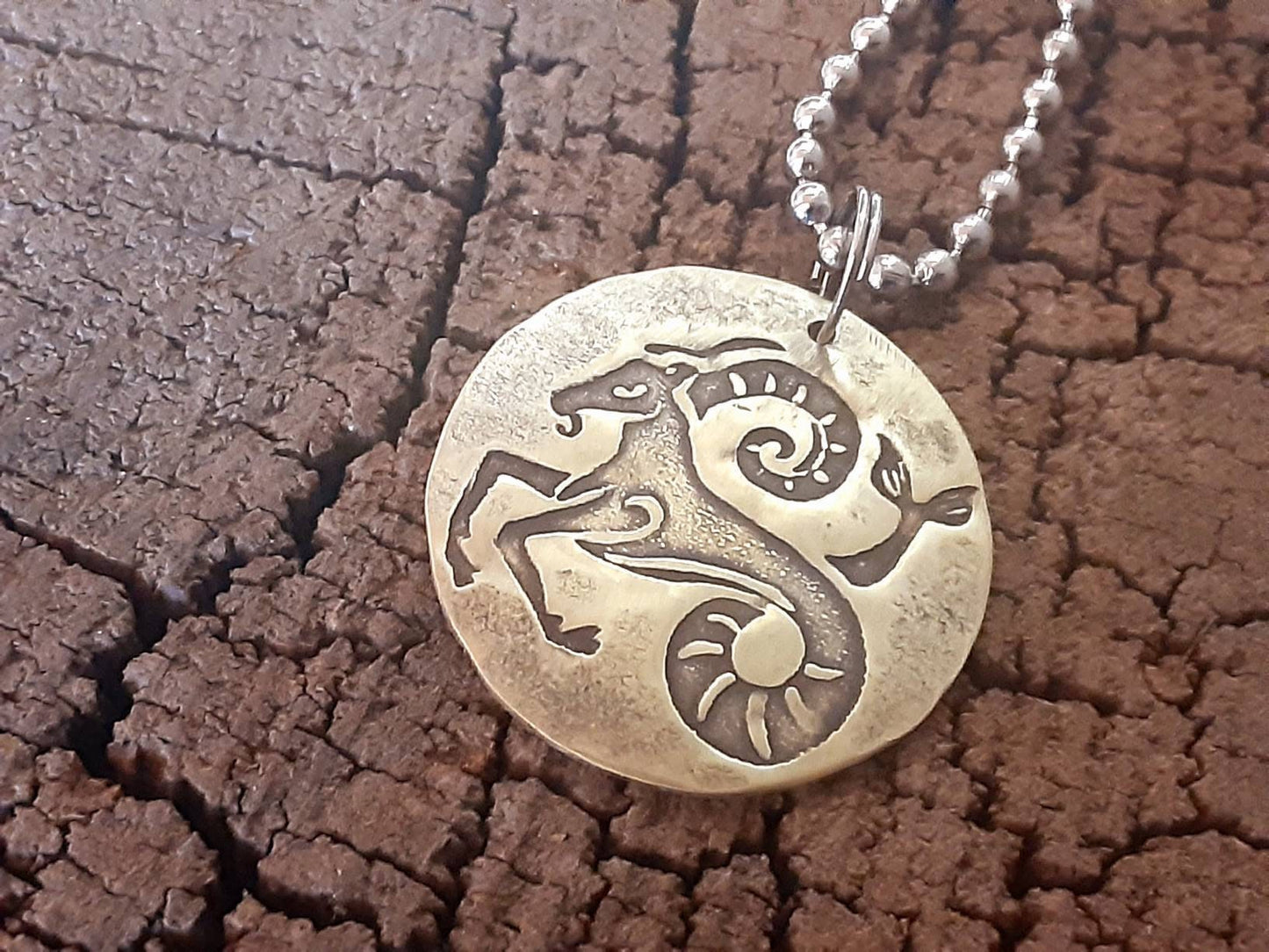 Capricorn zodiac sign necklace in various metals