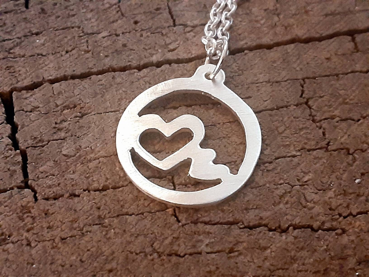 Sterling silver heart charm necklace