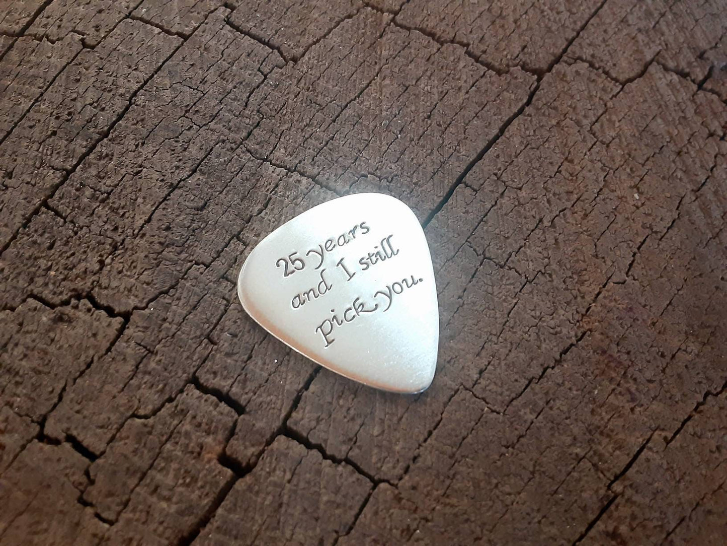 Guitar pick for the 25th silver anniversary in sterling silver