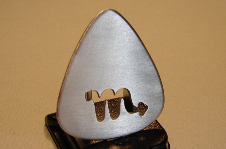 Zodiac sterling silver guitar pick