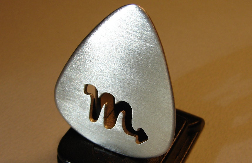 Zodiac sterling silver guitar pick