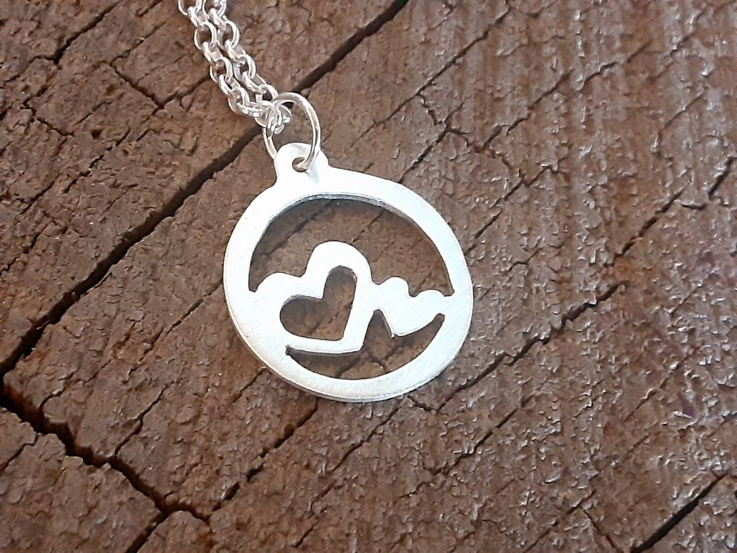 Sterling silver heart charm necklace