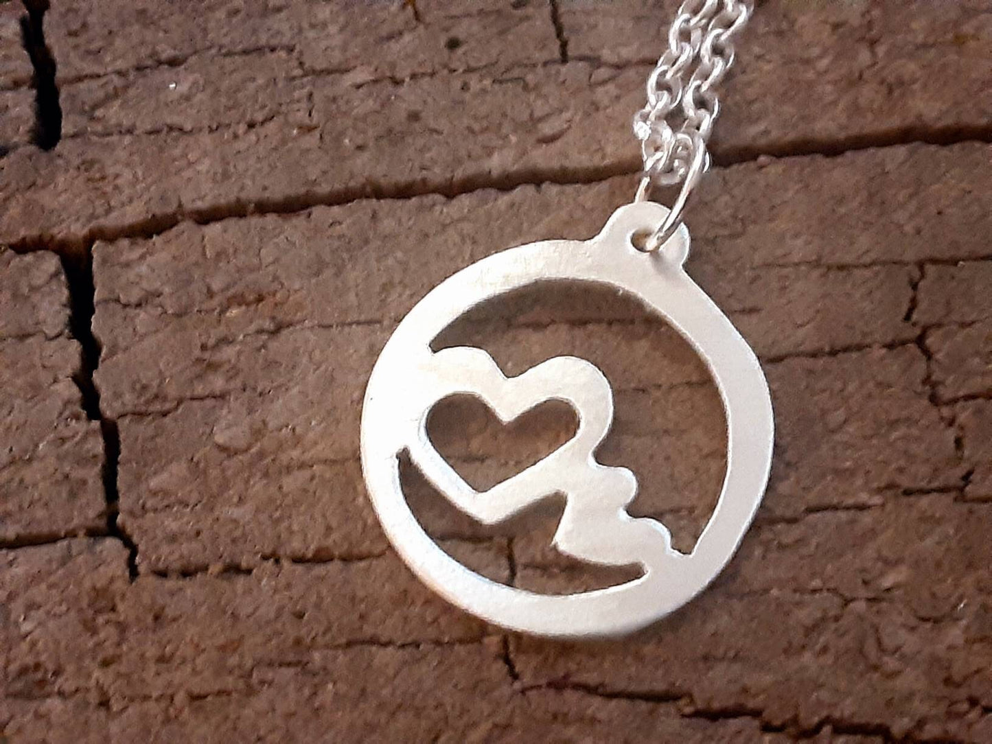 Sterling silver heart charm necklace