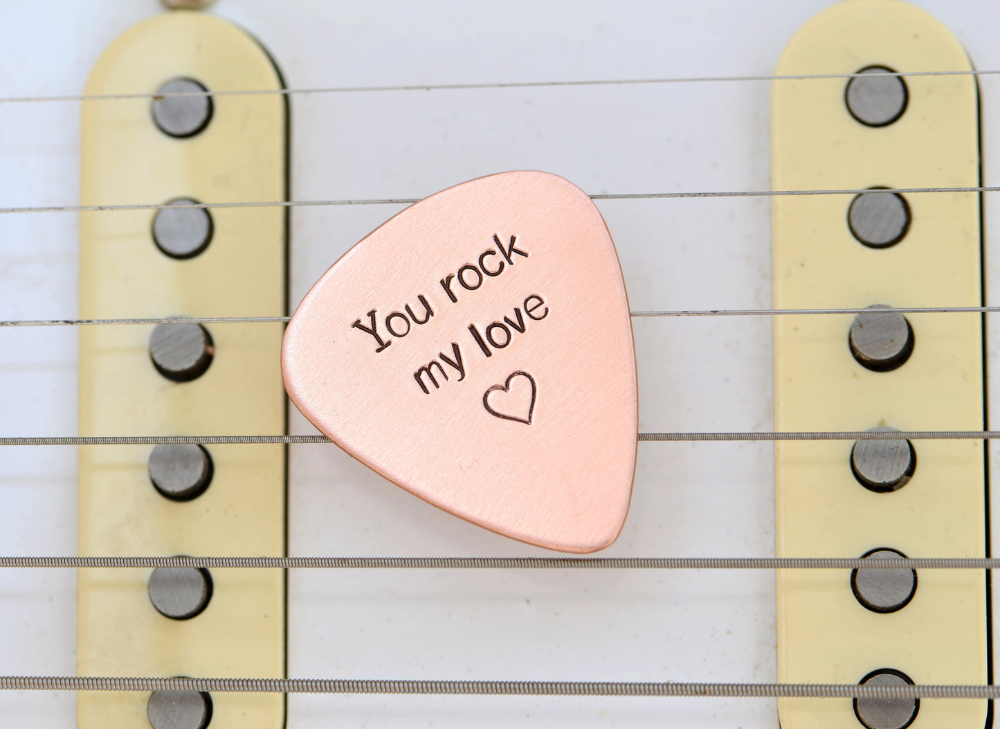 You rock my love guitar pick in copper