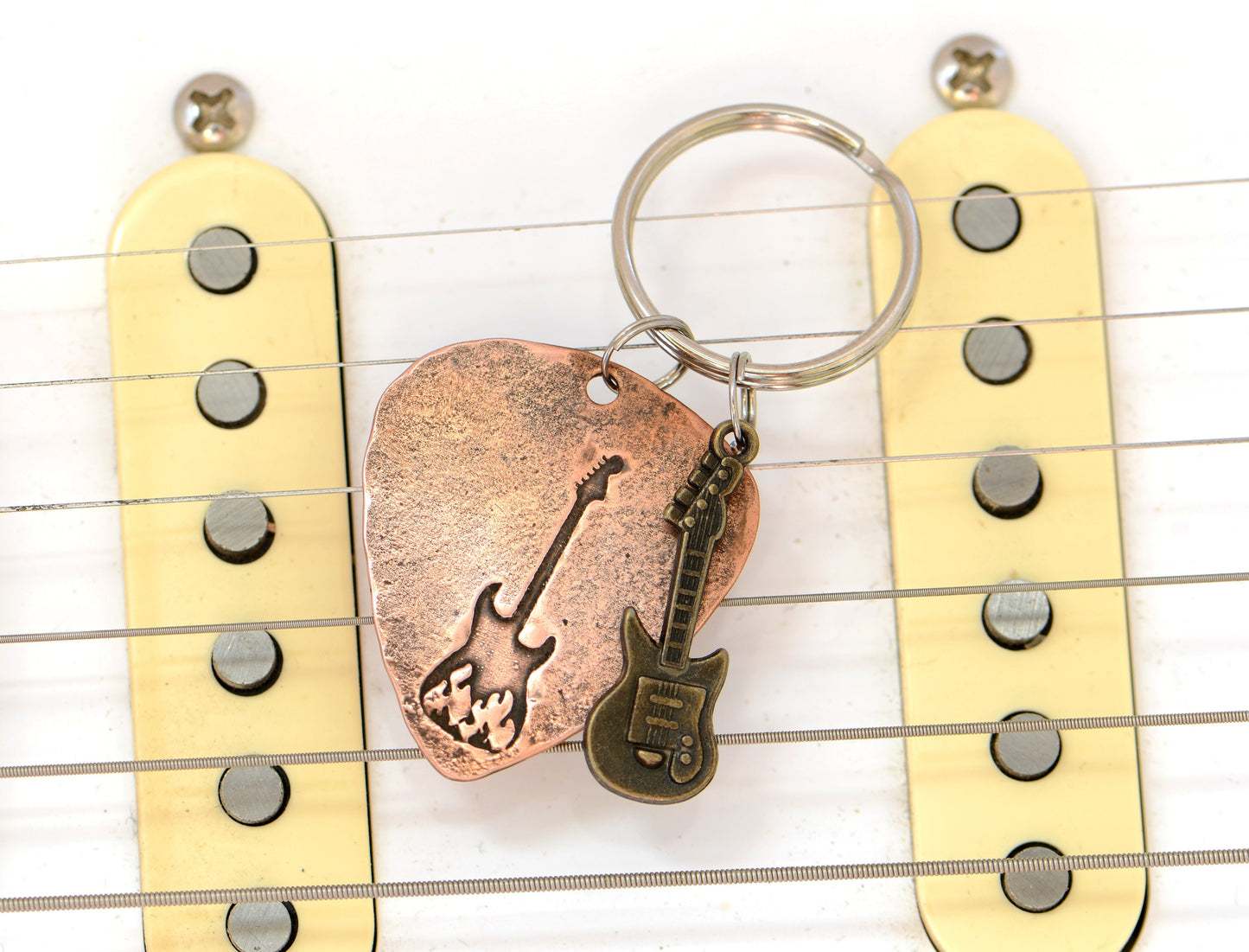 Flaming Design on a Guitar Guitar Pick Keychain