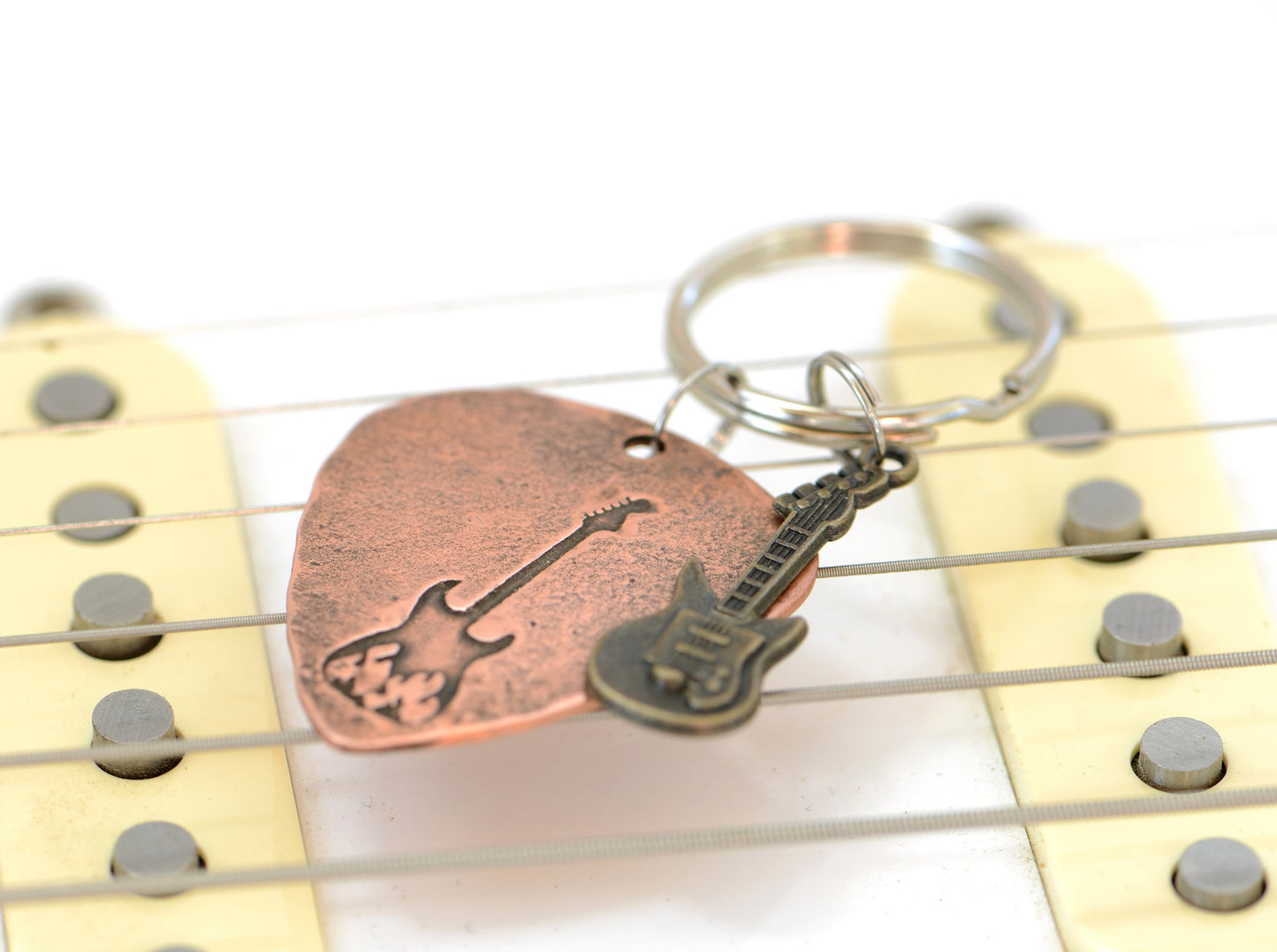 Flaming Design on a Guitar Guitar Pick Keychain