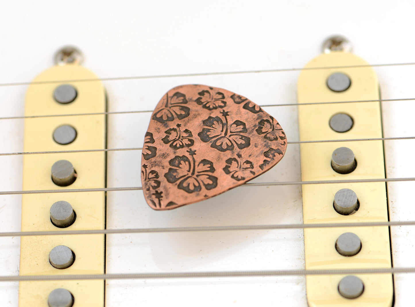 Hibiscus Flower on Guitar Pick handcrafted in Copper