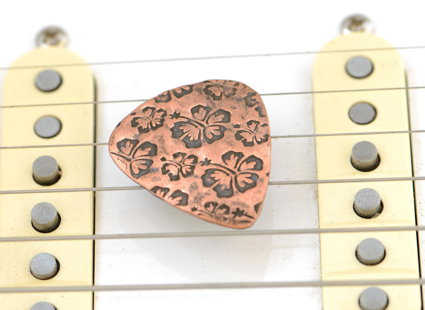 Hibiscus Flower on Guitar Pick handcrafted in Copper
