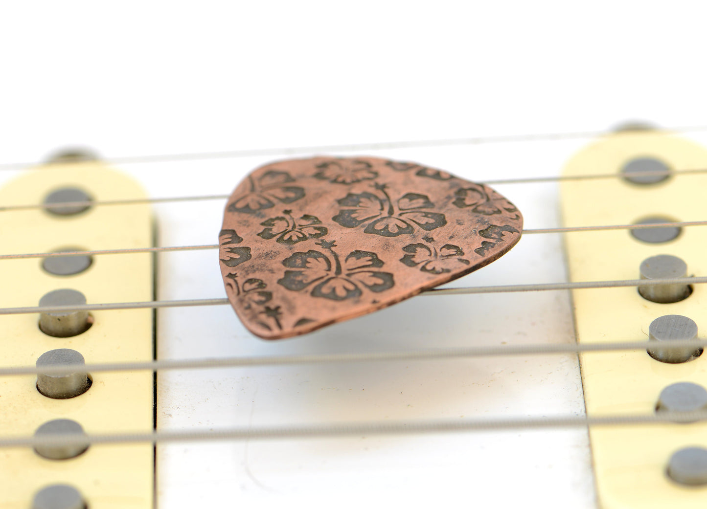 Hibiscus Flower on Guitar Pick handcrafted in Copper