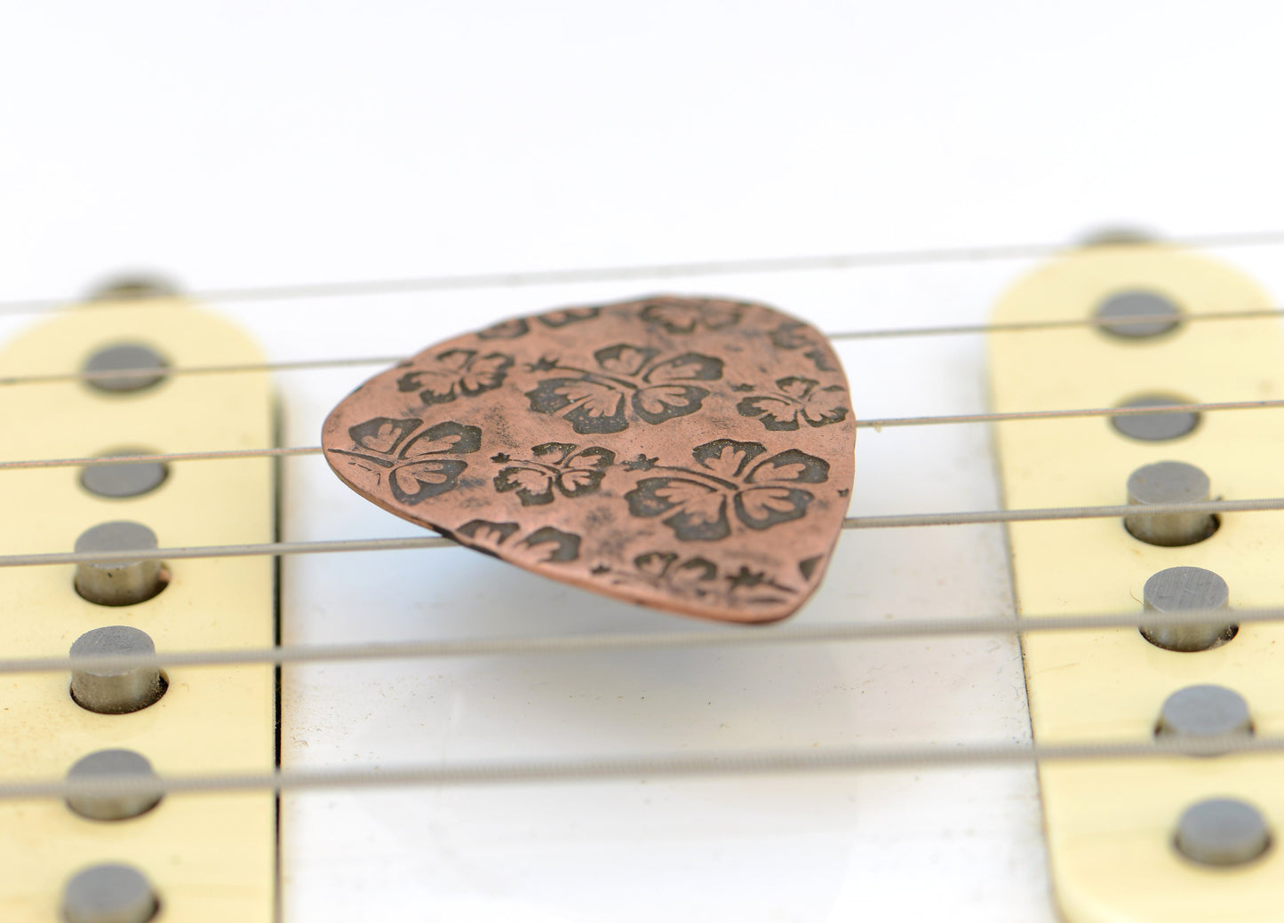 Hibiscus Flower on Guitar Pick handcrafted in Copper