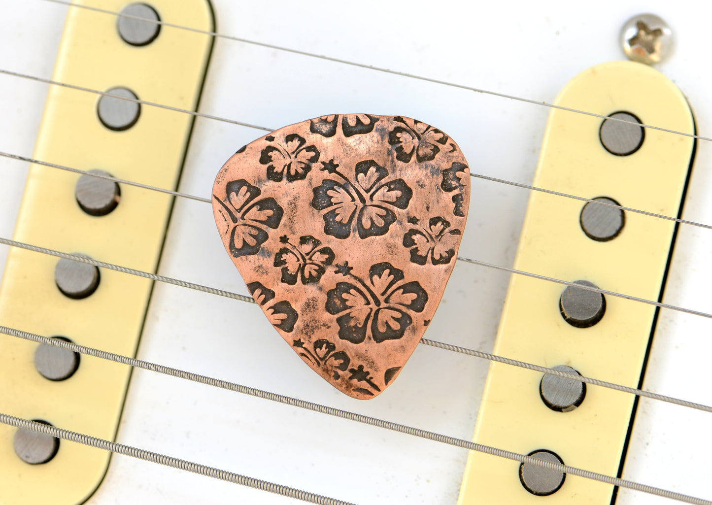 Hibiscus Flower on Guitar Pick handcrafted in Copper