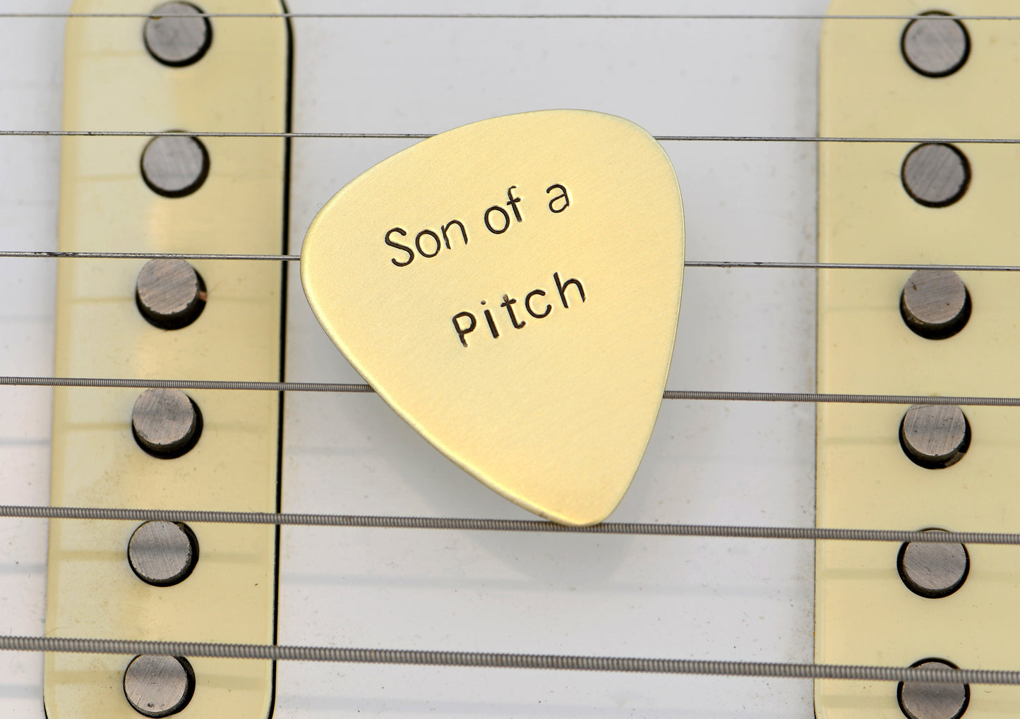 Son of a Pitch Bronze Guitar Pick