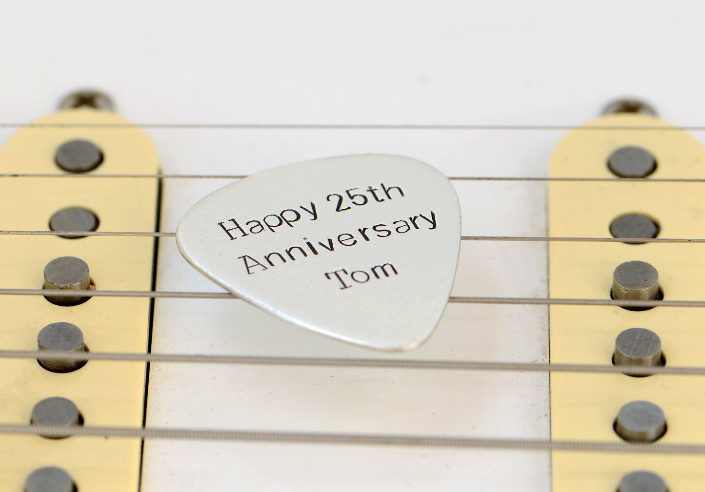 Guitar Pick in sterling silver to Celebrate 25th Silver Anniversary