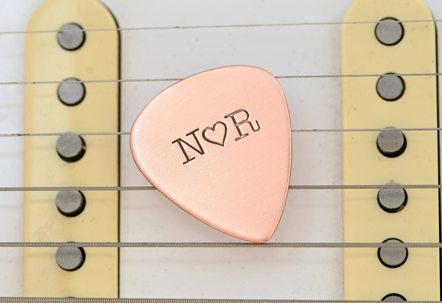 Initials with Love on a Copper Guitar Pick