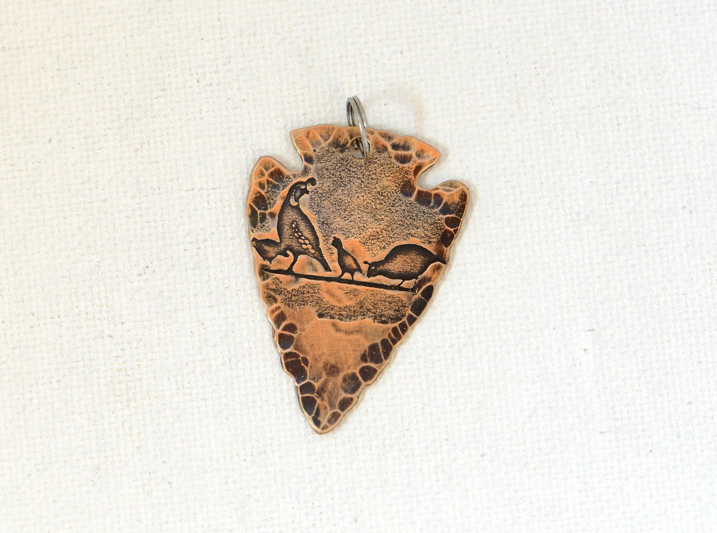 Bronze arrowhead with desert quail theme necklace