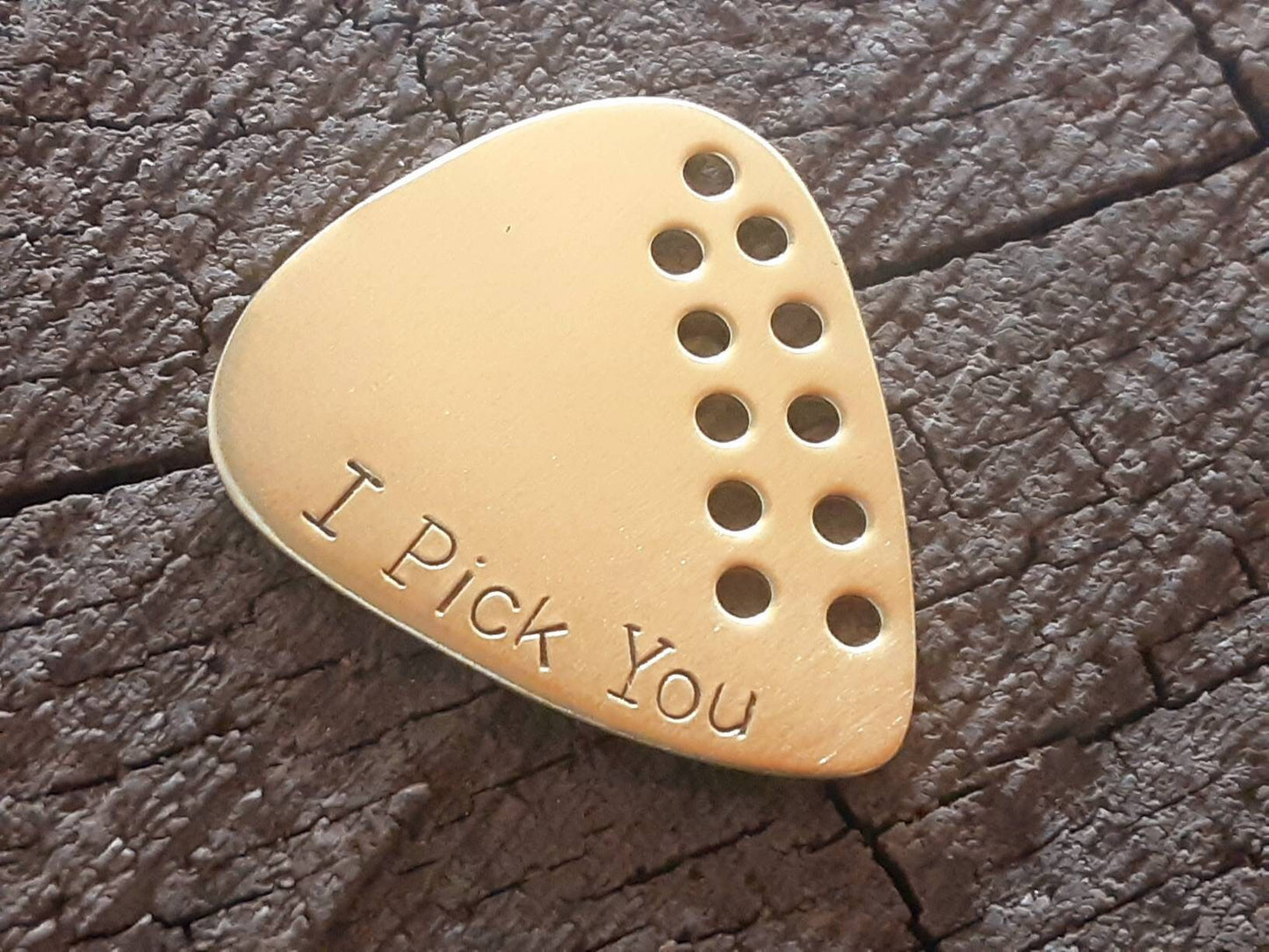 I pick you brass guitar pick with hole design