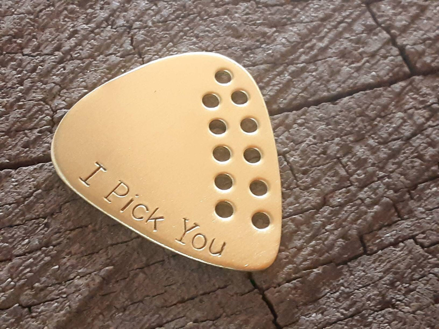 I pick you brass guitar pick with hole design