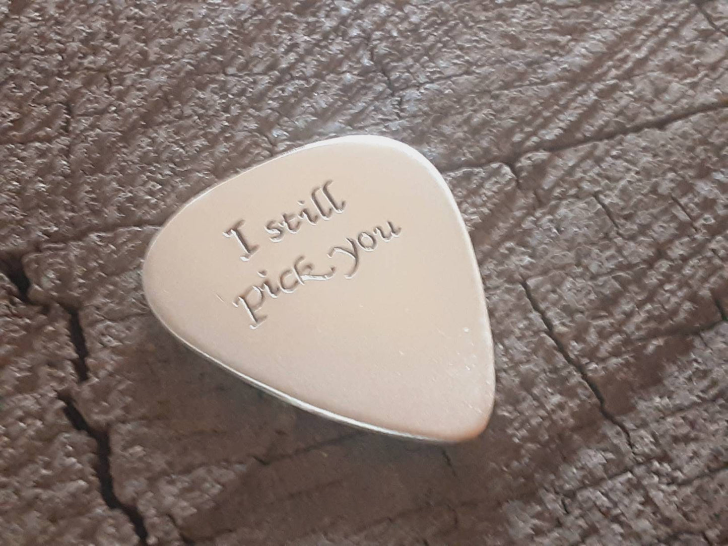 Sterling silver guitar pick for 25th silver anniversaries