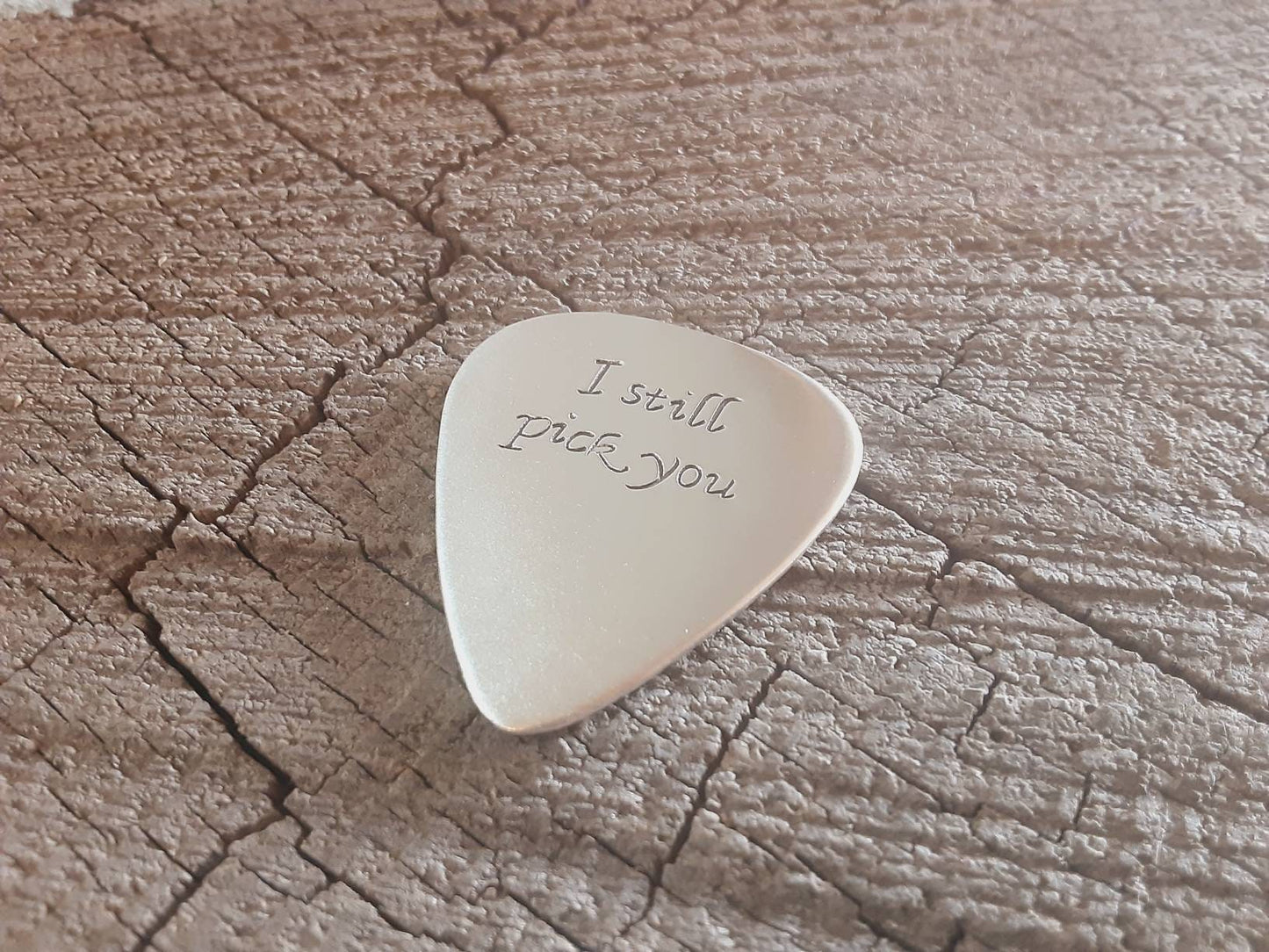 Sterling silver guitar pick for 25th silver anniversaries