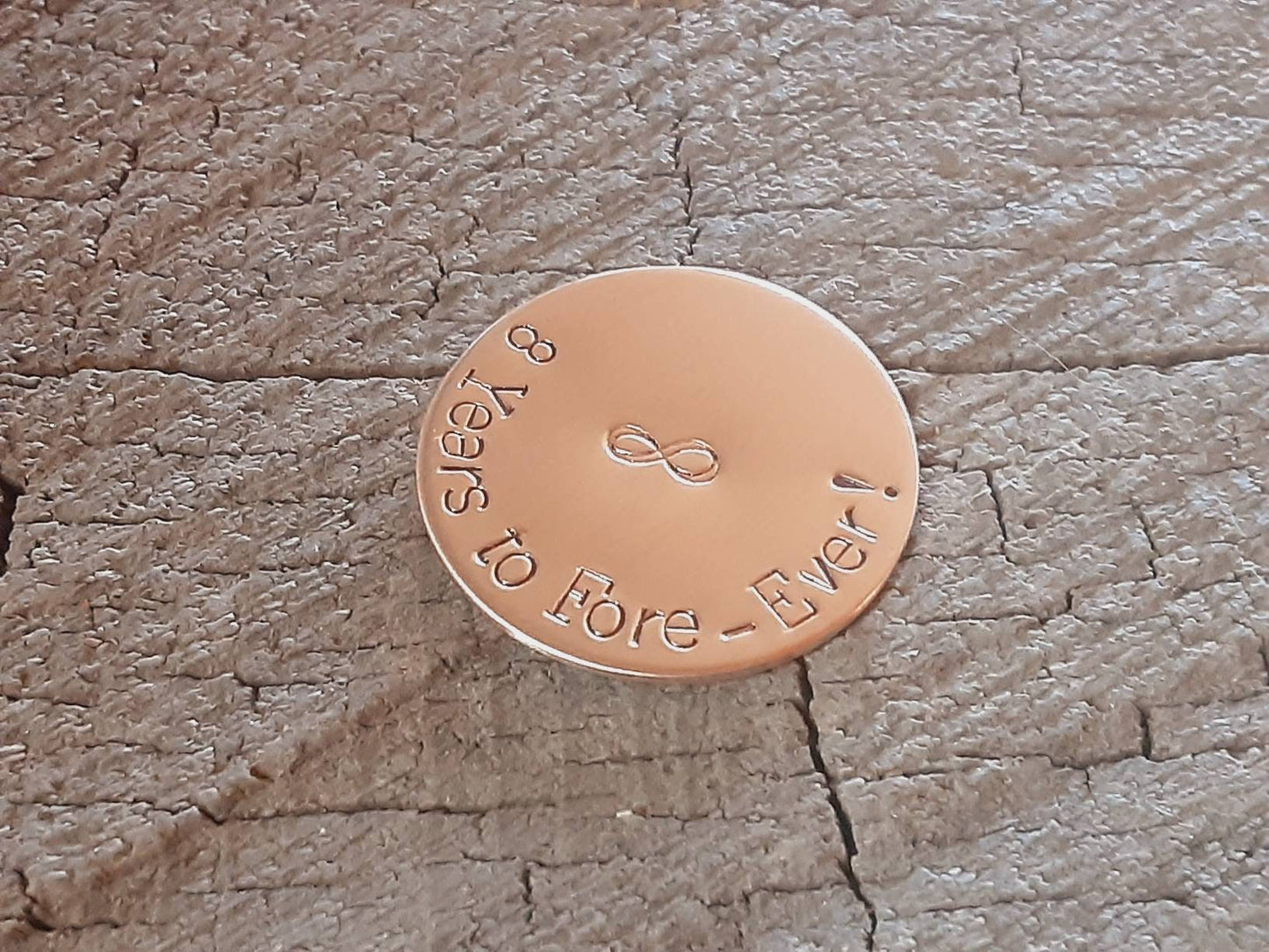 Bronze golf ball marker for 8th or 19th anniversary