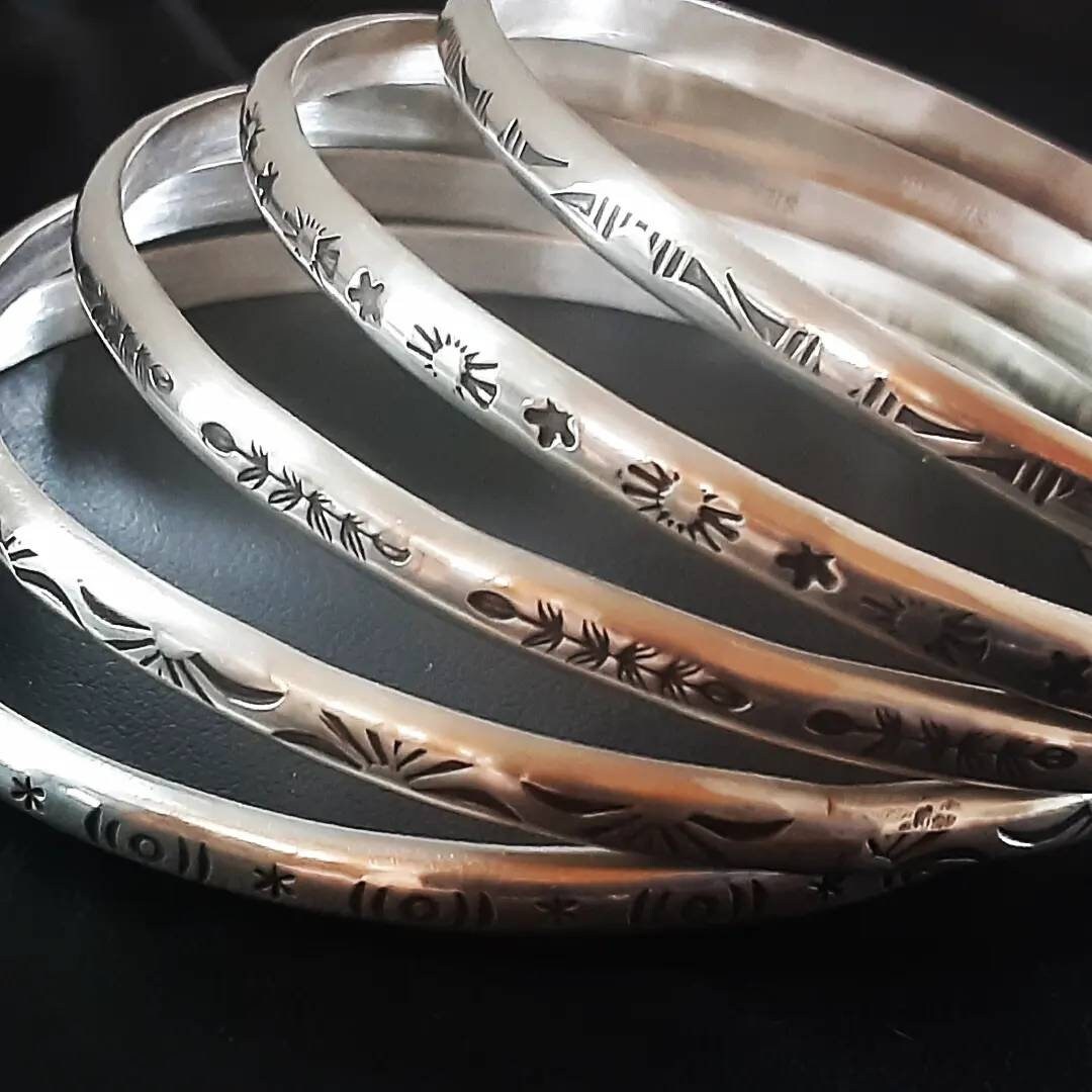 Bangle sets with hand stamped patterns in sterling silver