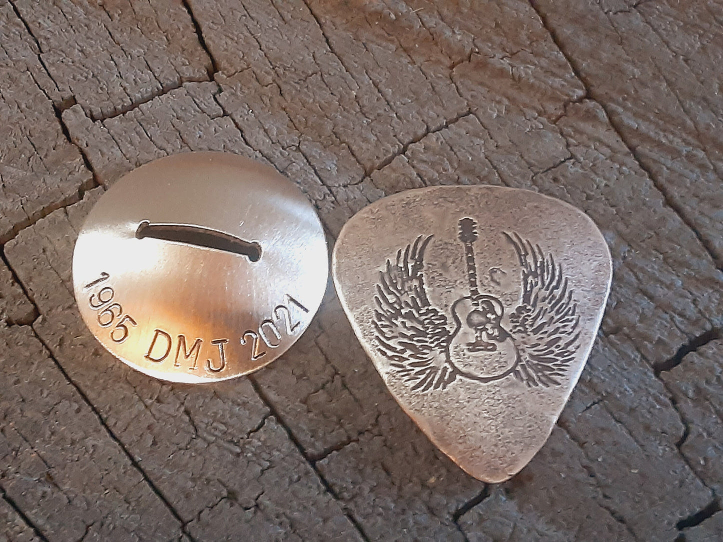 Bronze guitar pick with stand memorial