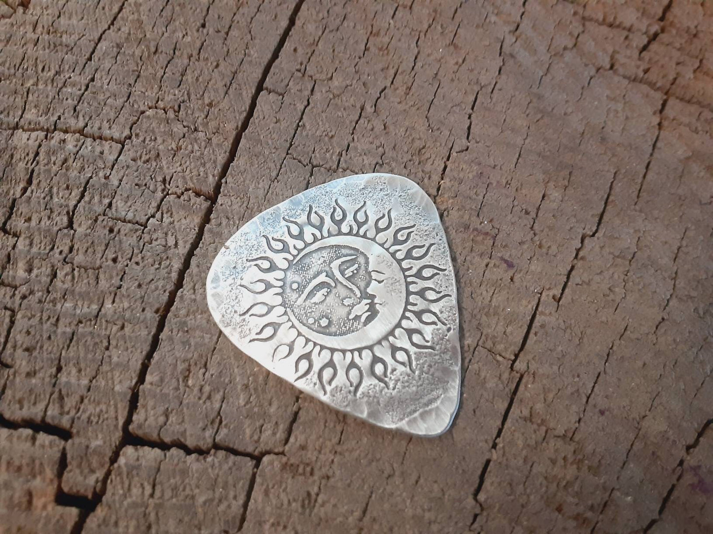 Sterling silver guitar pick with sun moon and stars