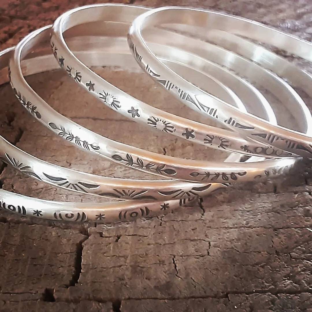 Bangle sets with hand stamped patterns in sterling silver