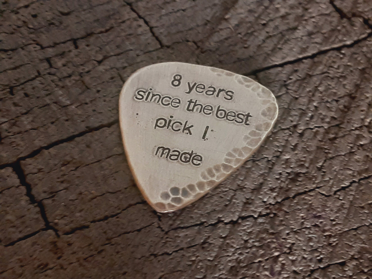 Guitar pick in bronze for 8th and 19th anniversary