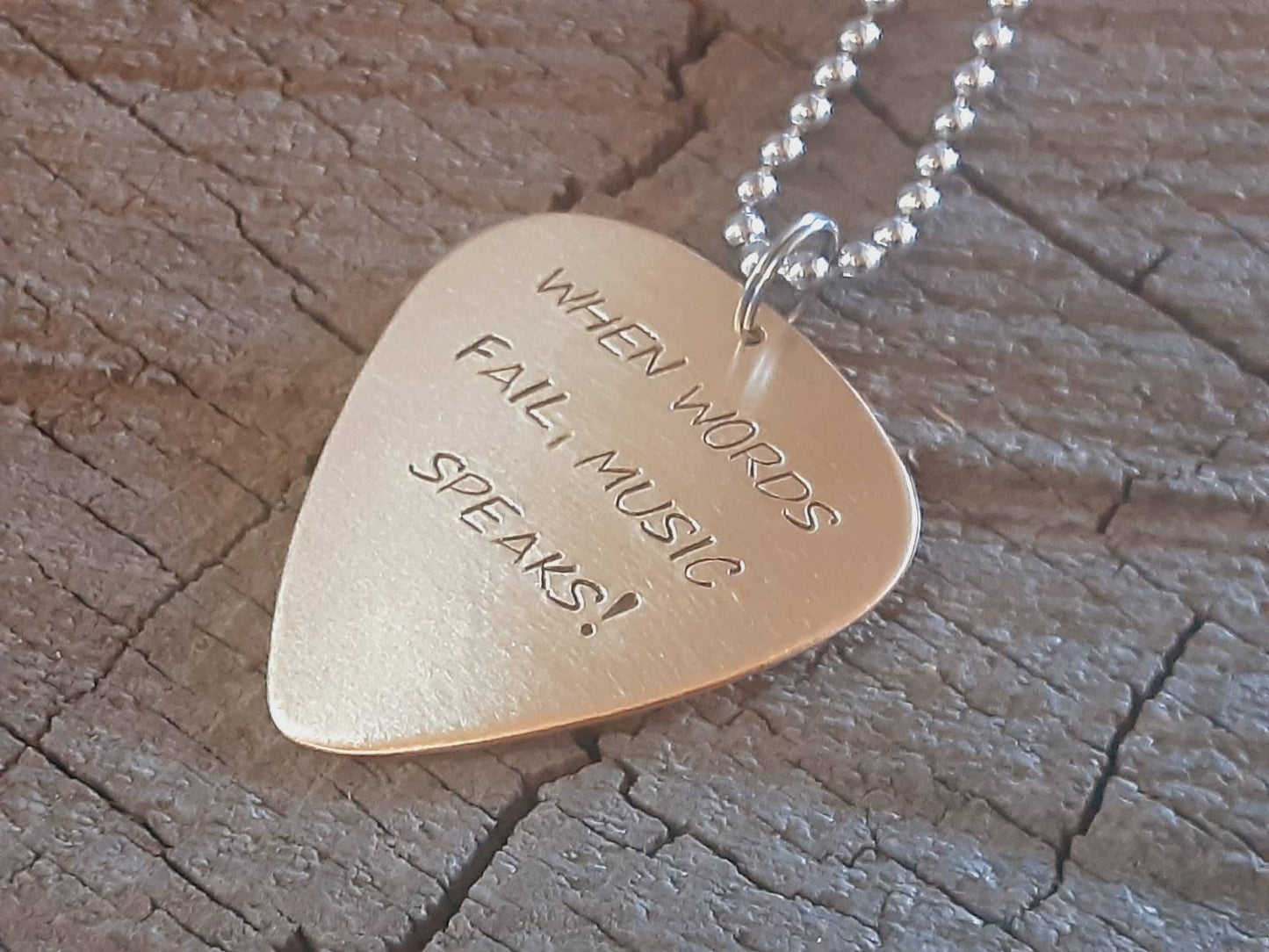 When words fail music speaks bronze necklace with guitar pick