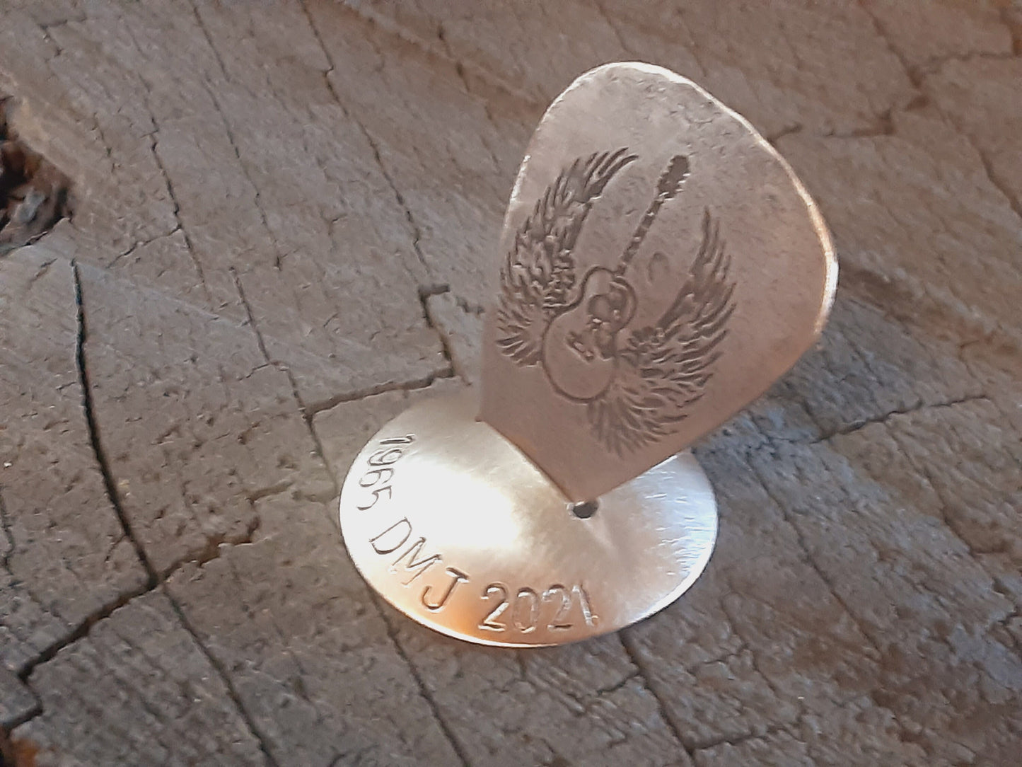Bronze guitar pick with stand memorial
