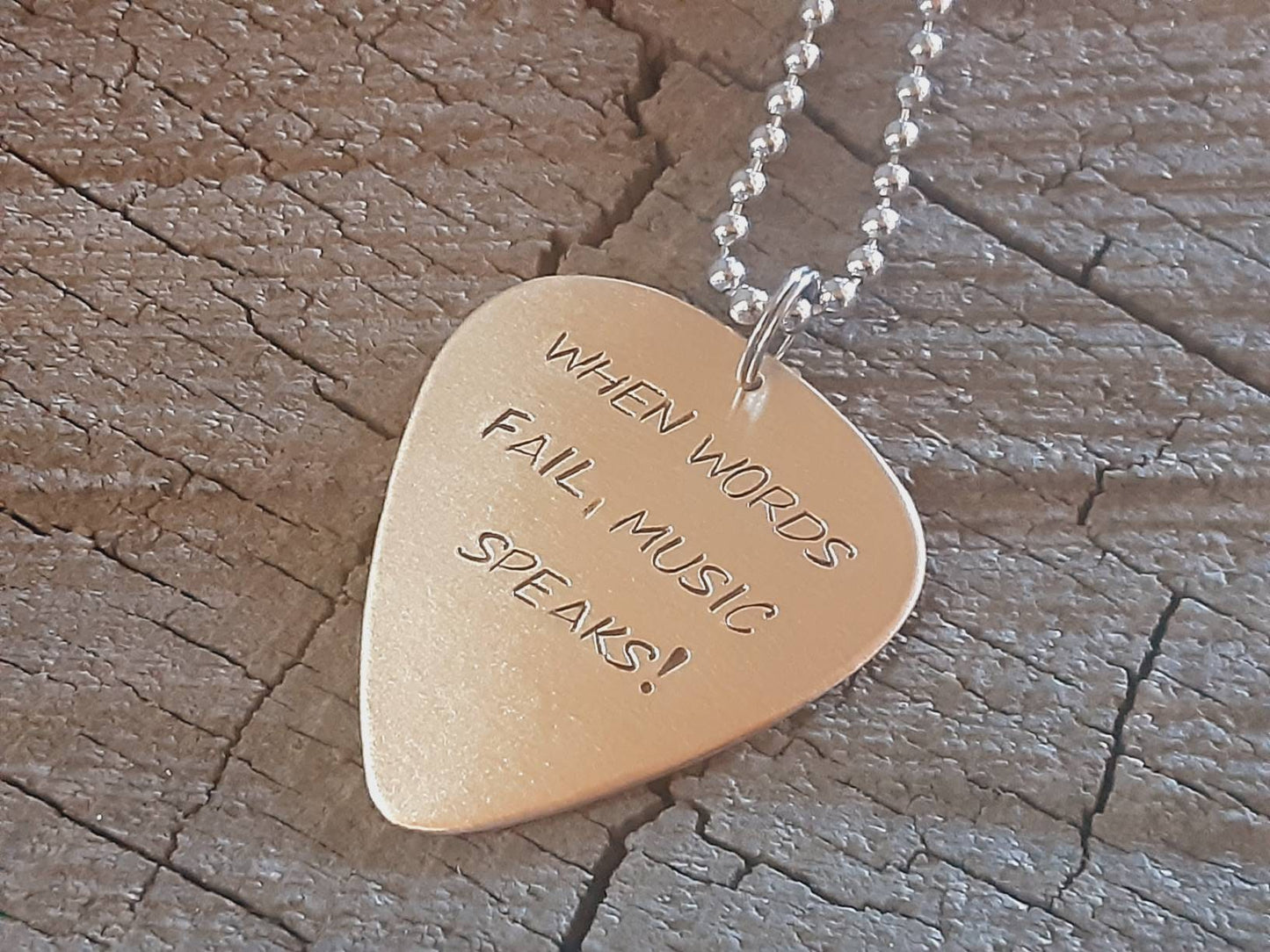 When words fail music speaks bronze necklace with guitar pick