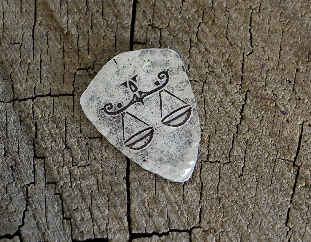 Libra zodiac sign guitar pick in shield shape