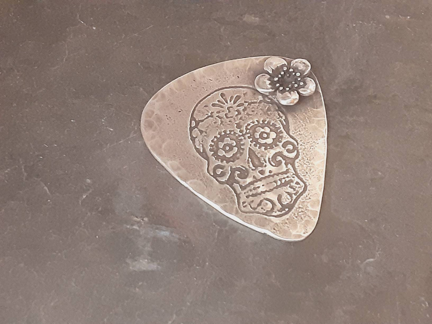Sterling silver guitar pick with sugar skull and 3D flower along with a with guitar pick holder stand combination