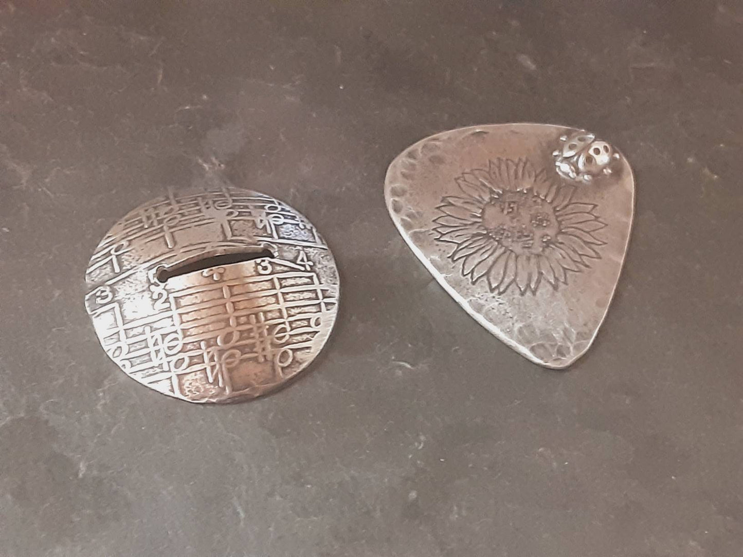 Guitar pick and stand combination in sterling silver with sunflower design and 3D soldered ladybug