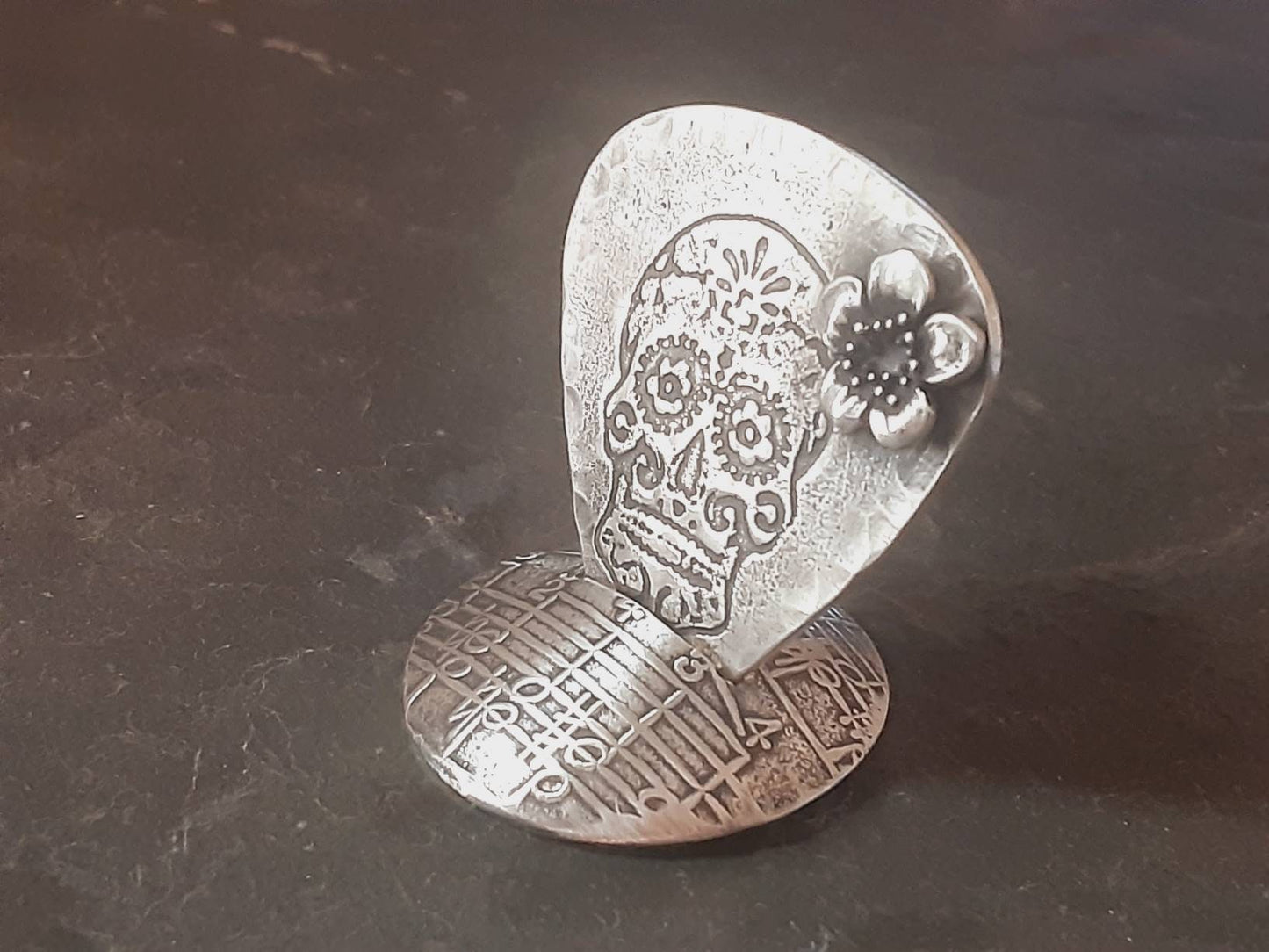 Sterling silver guitar pick with sugar skull and 3D flower along with a with guitar pick holder stand combination