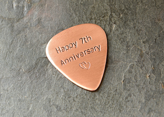 Copper guitar pick for the 7th anniversary or playing your guitar
