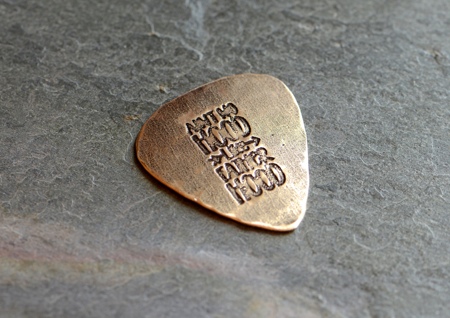 Guitar pick for dad in rustic brass